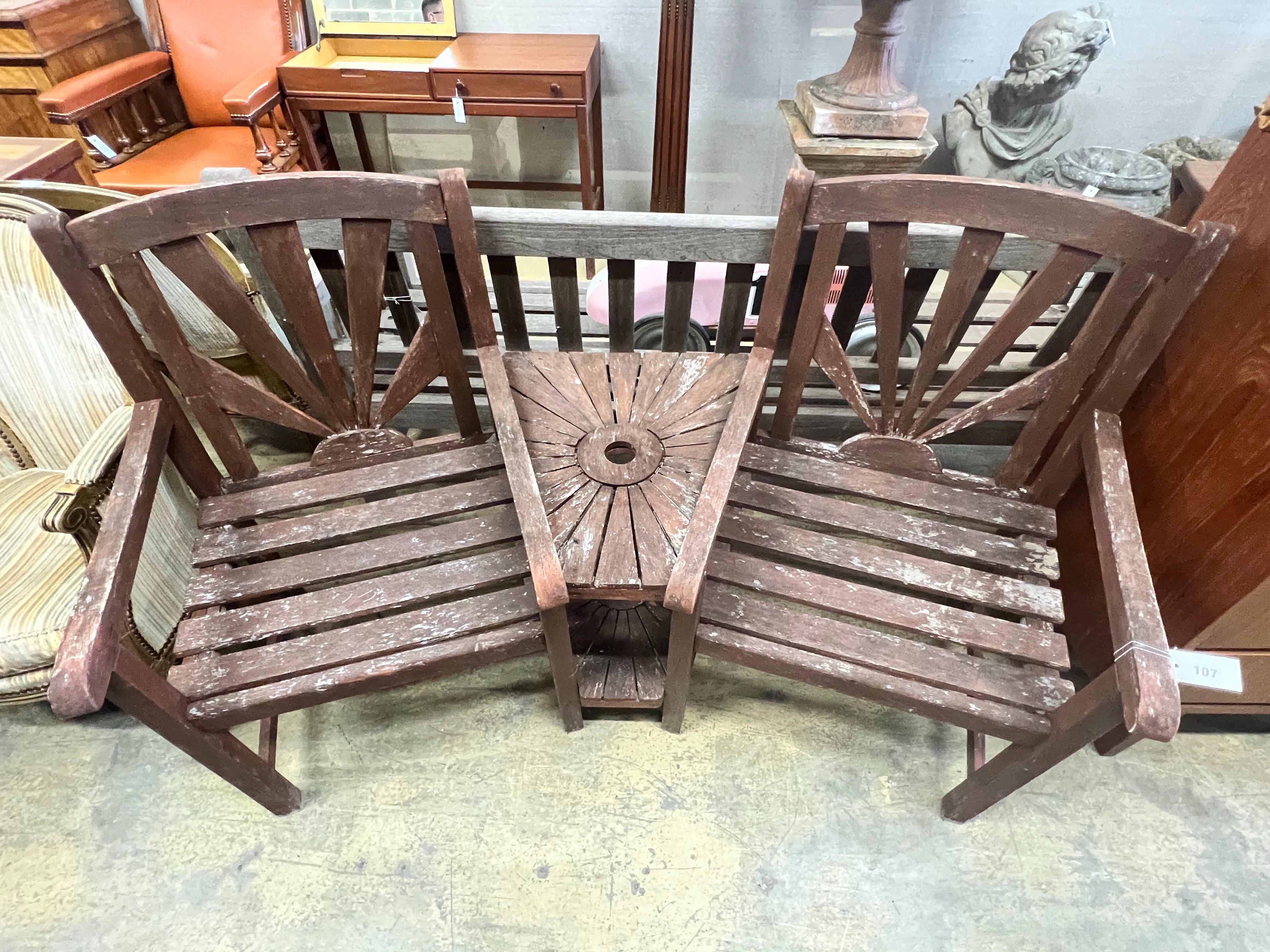 A stained teak duet garden bench, length 156cm, depth 54cm, height 94cm